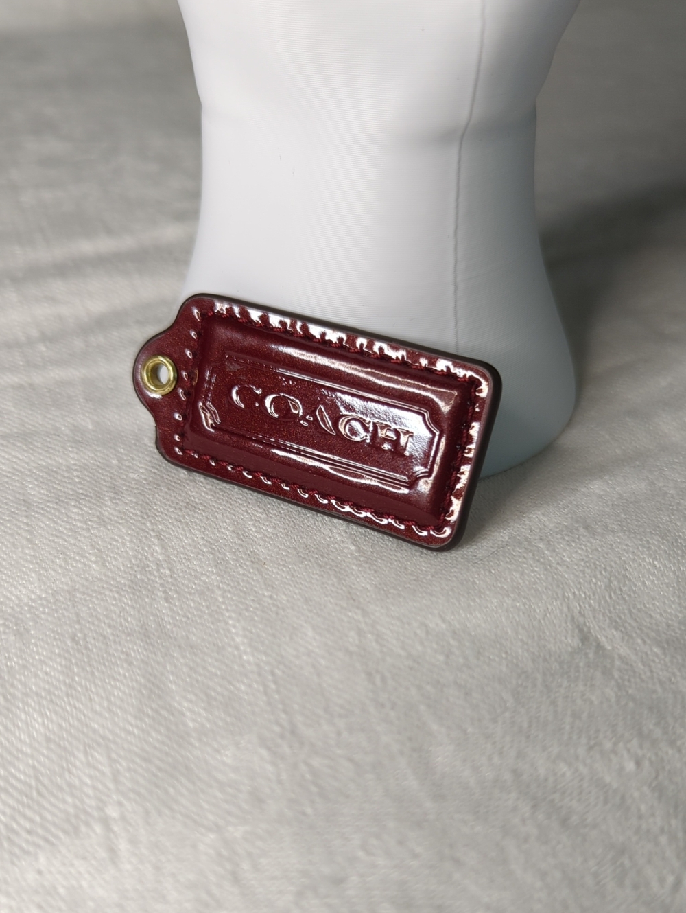 (0016) Coach Burgundy Patent Leather Hang Tag with Gold Grommet